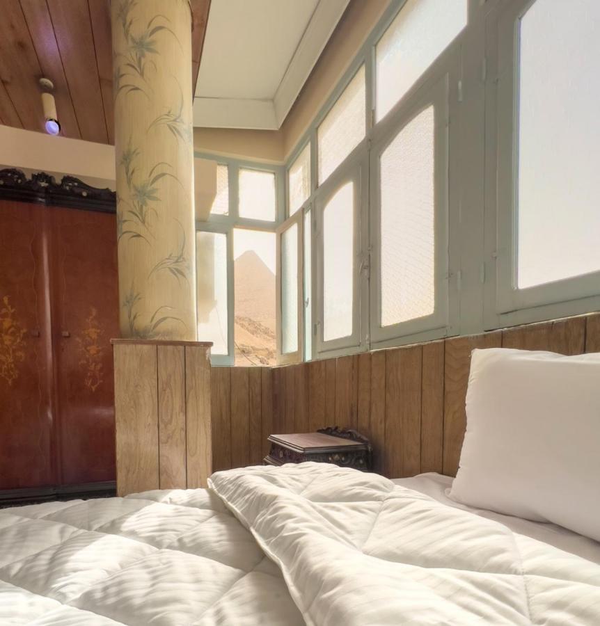 The Grand Pyramids View Hotel Kafret el-Gabal Extérieur photo
