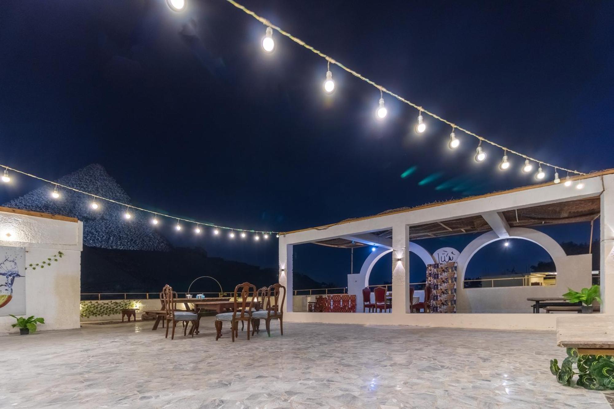 The Grand Pyramids View Hotel Kafret el-Gabal Extérieur photo