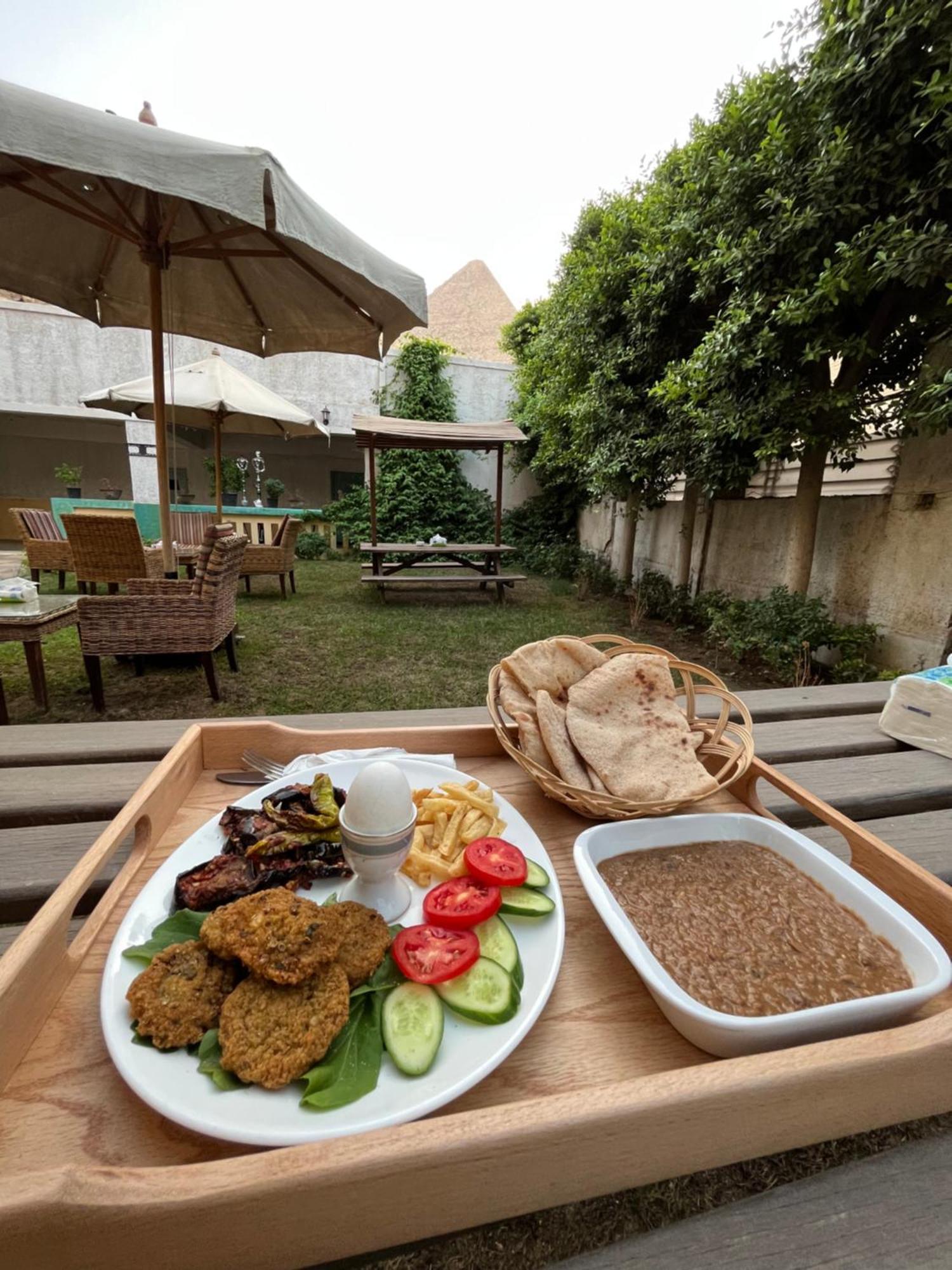 The Grand Pyramids View Hotel Kafret el-Gabal Extérieur photo