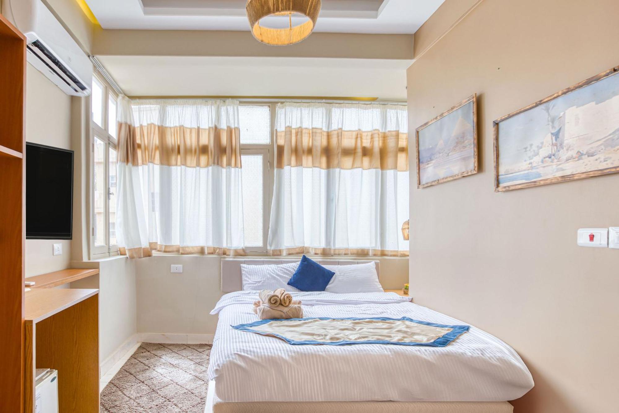 The Grand Pyramids View Hotel Kafret el-Gabal Chambre photo