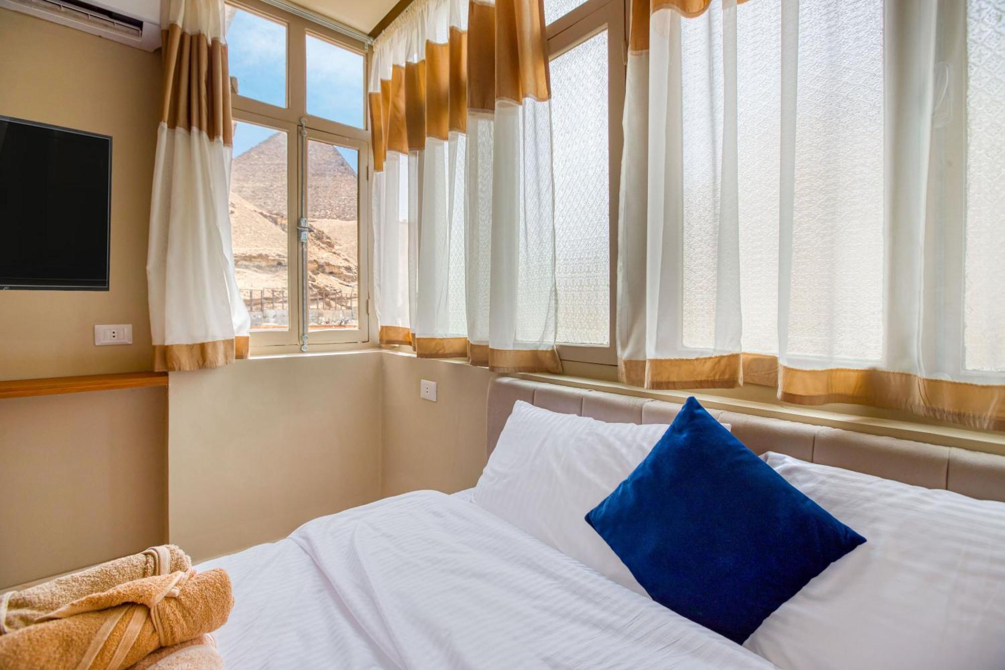 The Grand Pyramids View Hotel Kafret el-Gabal Chambre photo