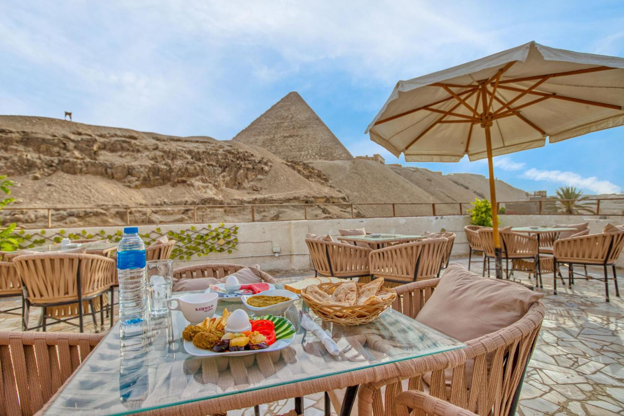 The Grand Pyramids View Hotel Kafret el-Gabal Extérieur photo