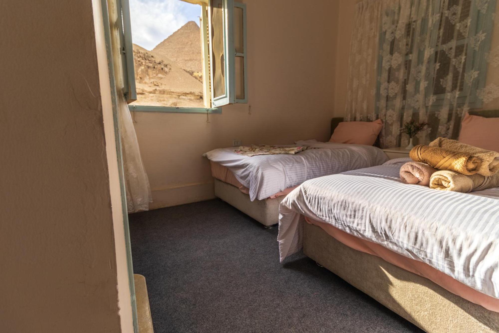 The Grand Pyramids View Hotel Kafret el-Gabal Chambre photo