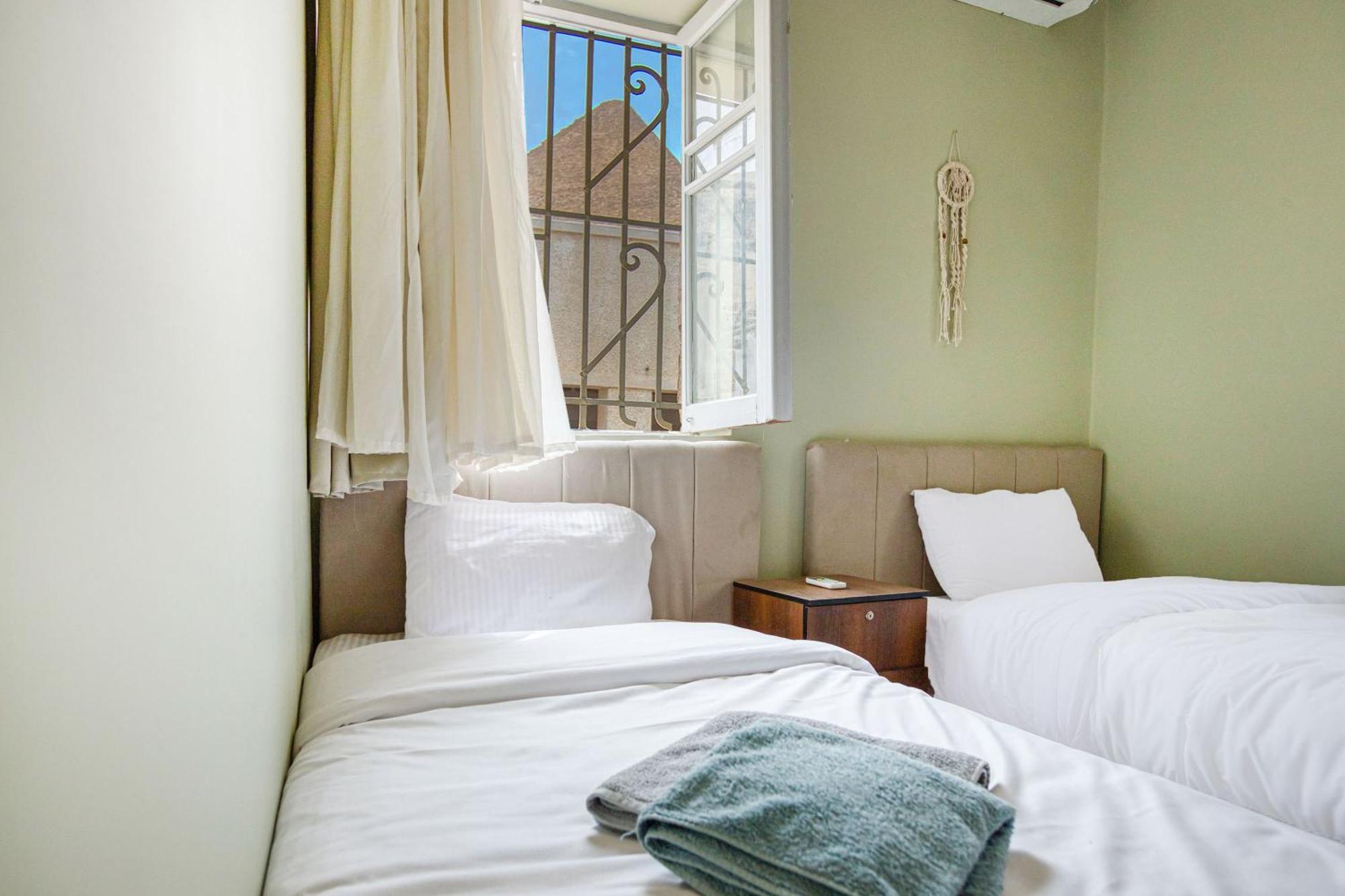 The Grand Pyramids View Hotel Kafret el-Gabal Chambre photo
